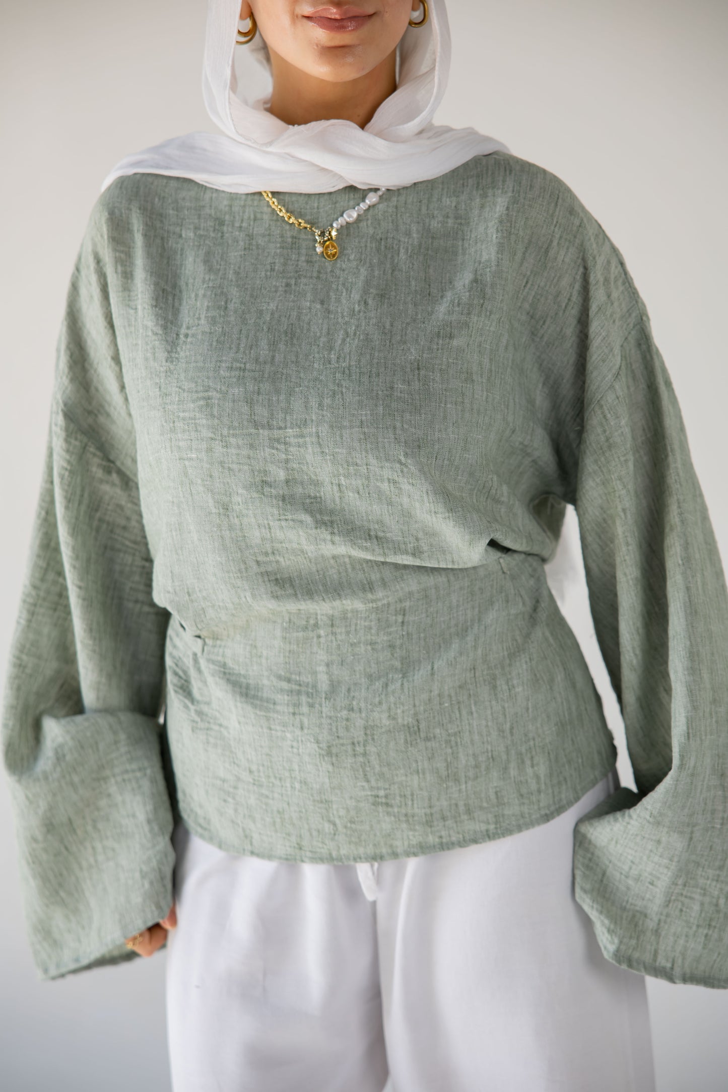 Iris linen top in sage green
